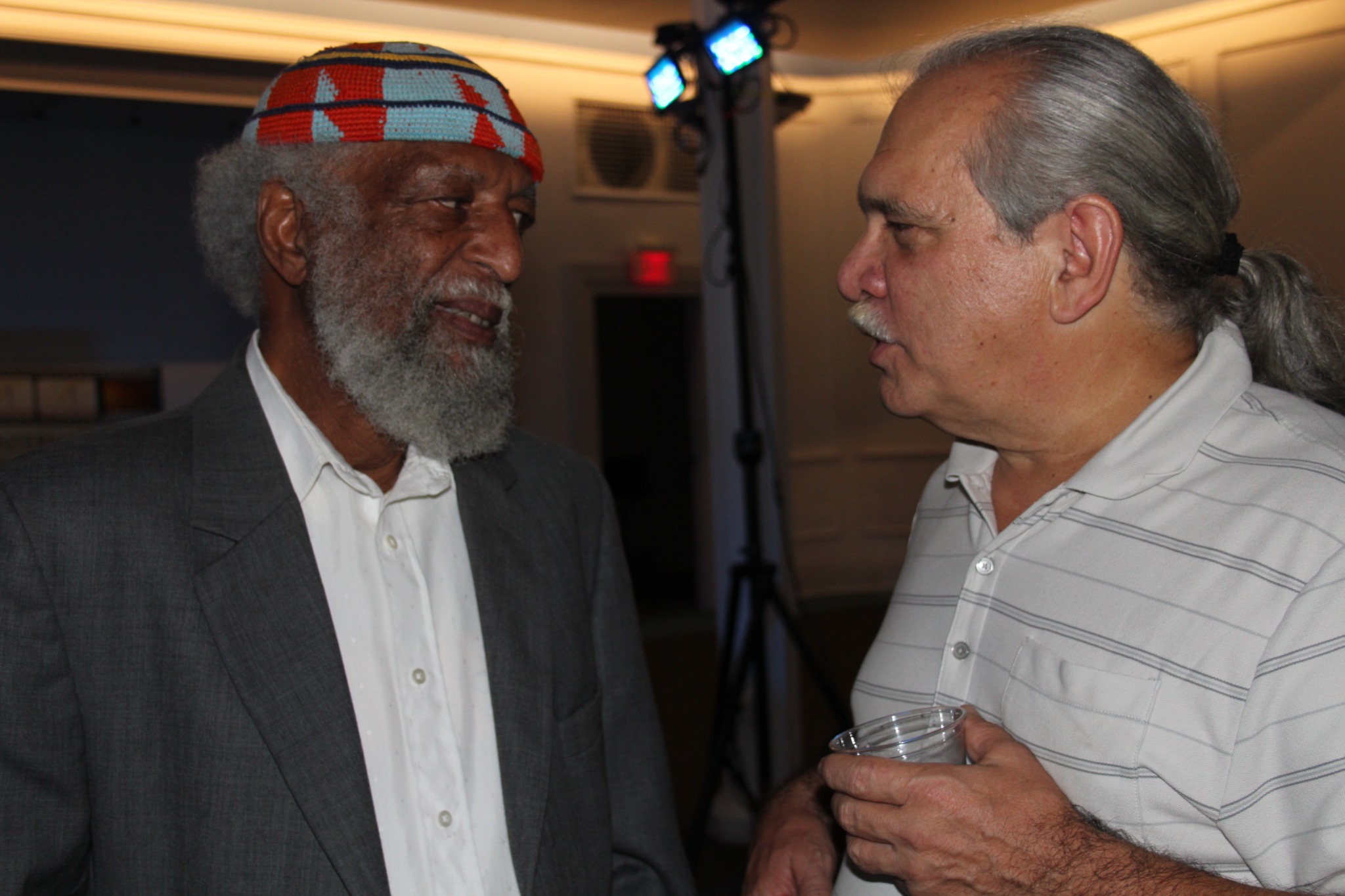 Bill Foster in conversation with a guest during the Jazz Network Foundation anniversary celebration